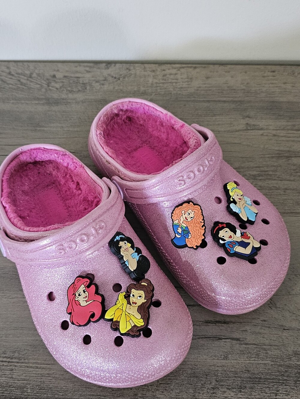 Crocs Kids' Pink Glitter Lined Clogs with Princess Charms C 10
